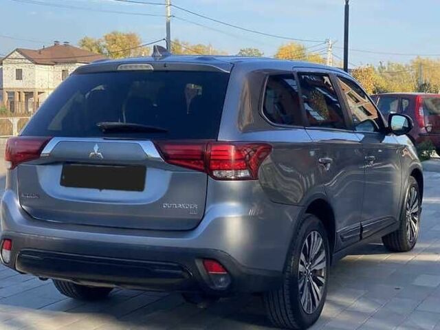 Сірий Міцубісі Аутлендер, об'ємом двигуна 2.4 л та пробігом 133 тис. км за 14000 $, фото 10 на Automoto.ua