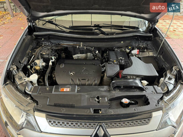 Серый Мицубиси Аутлендер, объемом двигателя 2 л и пробегом 137 тыс. км за 16500 $, фото 11 на Automoto.ua