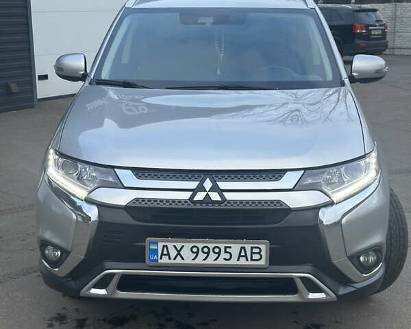 Серый Мицубиси Аутлендер, объемом двигателя 2.4 л и пробегом 115 тыс. км за 17500 $, фото 1 на Automoto.ua