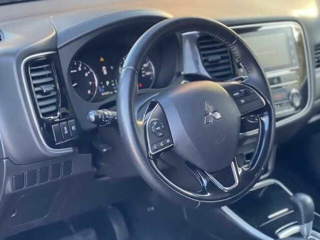 Сірий Міцубісі Аутлендер, об'ємом двигуна 2.4 л та пробігом 133 тис. км за 14000 $, фото 3 на Automoto.ua