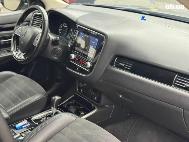 Серый Мицубиси Аутлендер, объемом двигателя 2.4 л и пробегом 131 тыс. км за 17440 $, фото 16 на Automoto.ua