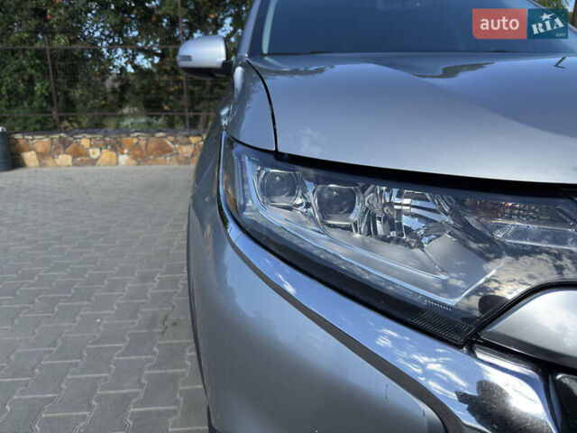 Серый Мицубиси Аутлендер, объемом двигателя 2.36 л и пробегом 123 тыс. км за 22000 $, фото 7 на Automoto.ua