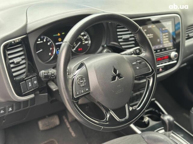 Серый Мицубиси Аутлендер, объемом двигателя 2.4 л и пробегом 131 тыс. км за 17440 $, фото 18 на Automoto.ua