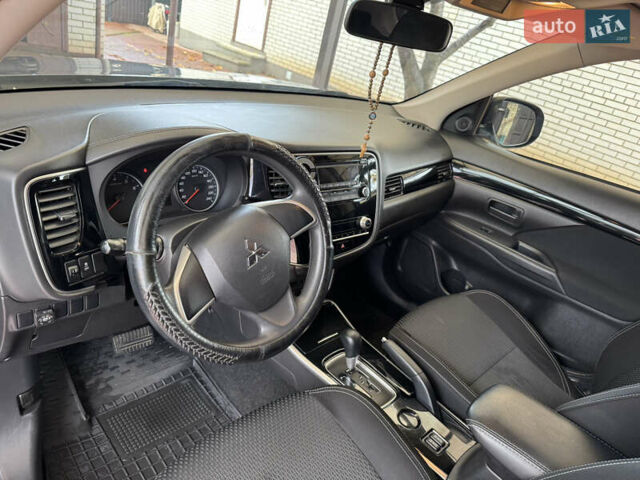 Серый Мицубиси Аутлендер, объемом двигателя 2 л и пробегом 137 тыс. км за 16500 $, фото 12 на Automoto.ua