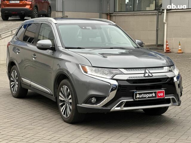 Серый Мицубиси Аутлендер, объемом двигателя 2.4 л и пробегом 131 тыс. км за 17440 $, фото 2 на Automoto.ua