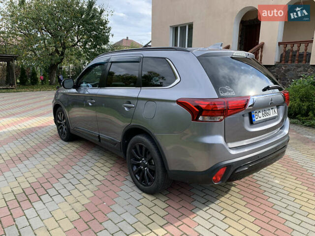 Сірий Міцубісі Аутлендер, об'ємом двигуна 2.38 л та пробігом 130 тис. км за 15000 $, фото 4 на Automoto.ua
