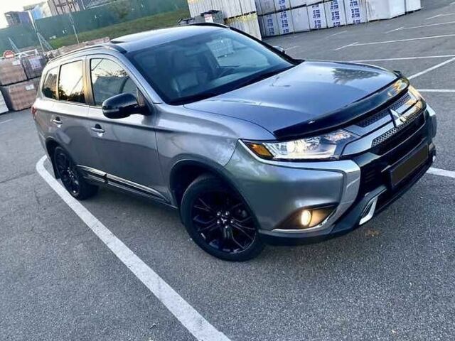 Серый Мицубиси Аутлендер, объемом двигателя 2.4 л и пробегом 93 тыс. км за 14600 $, фото 1 на Automoto.ua