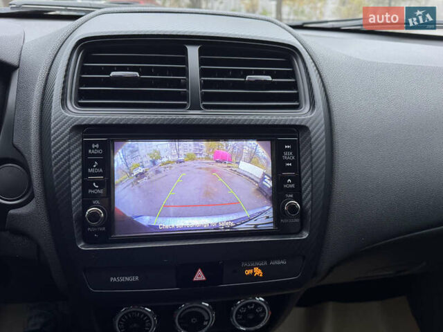 Серый Мицубиси Аутлендер, объемом двигателя 2 л и пробегом 45 тыс. км за 14000 $, фото 28 на Automoto.ua