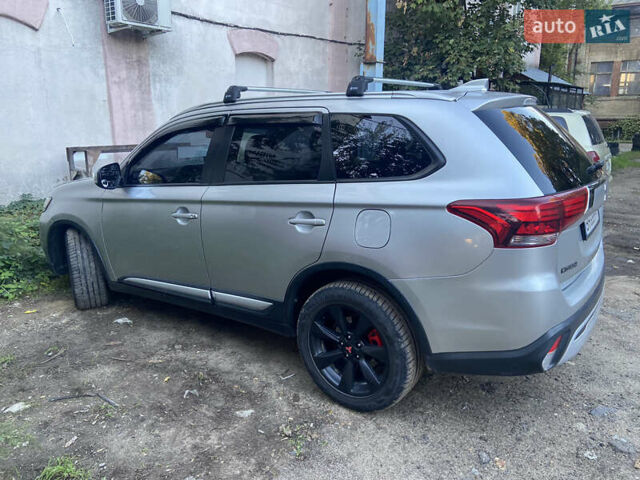 Серый Мицубиси Аутлендер, объемом двигателя 2.36 л и пробегом 135 тыс. км за 19200 $, фото 32 на Automoto.ua