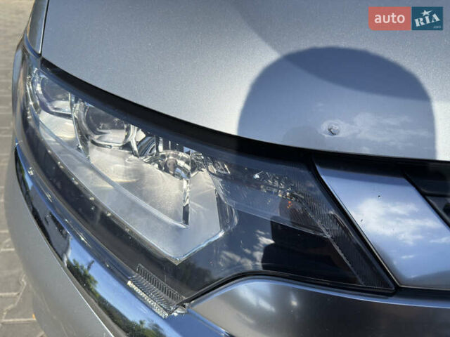 Серый Мицубиси Аутлендер, объемом двигателя 2.36 л и пробегом 123 тыс. км за 22000 $, фото 9 на Automoto.ua