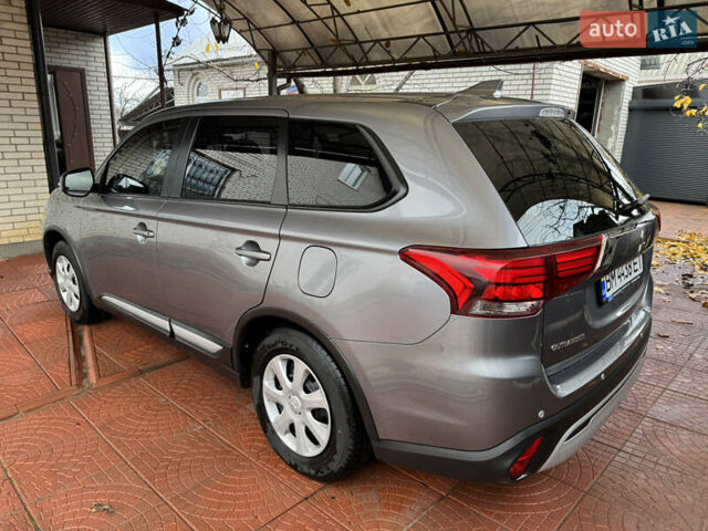 Серый Мицубиси Аутлендер, объемом двигателя 2 л и пробегом 137 тыс. км за 16500 $, фото 6 на Automoto.ua