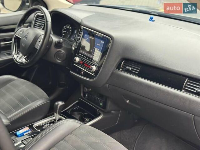 Сірий Міцубісі Аутлендер, об'ємом двигуна 2.4 л та пробігом 131 тис. км за 17440 $, фото 16 на Automoto.ua