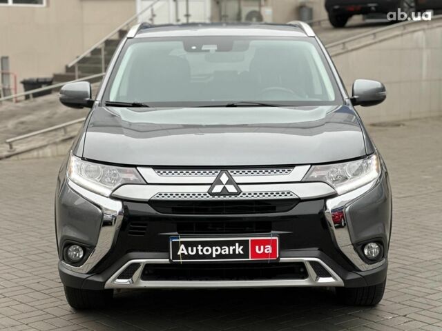 Серый Мицубиси Аутлендер, объемом двигателя 2.4 л и пробегом 131 тыс. км за 17440 $, фото 1 на Automoto.ua