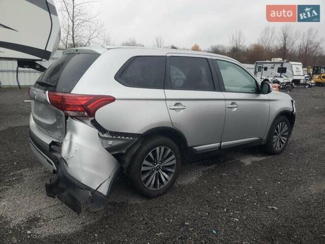 Серый Мицубиси Аутлендер, объемом двигателя 2.36 л и пробегом 112 тыс. км за 2900 $, фото 2 на Automoto.ua