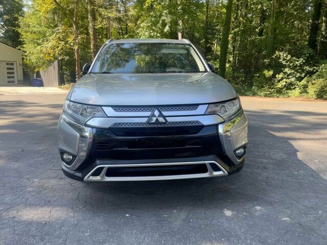 Серый Мицубиси Аутлендер, объемом двигателя 2.4 л и пробегом 35 тыс. км за 5100 $, фото 1 на Automoto.ua