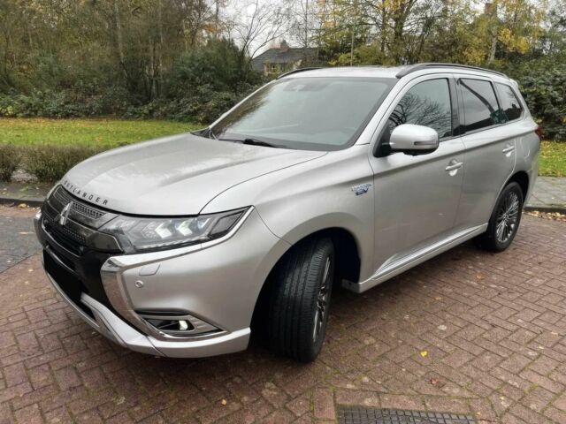 Серый Мицубиси Аутлендер, объемом двигателя 2.4 л и пробегом 49 тыс. км за 13300 $, фото 3 на Automoto.ua