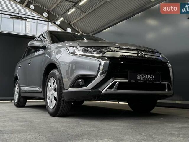 Серый Мицубиси Аутлендер, объемом двигателя 2 л и пробегом 91 тыс. км за 19000 $, фото 27 на Automoto.ua