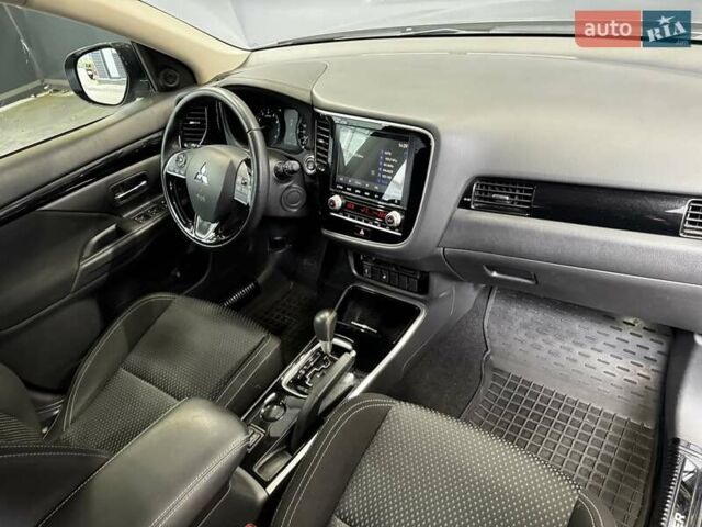 Серый Мицубиси Аутлендер, объемом двигателя 2 л и пробегом 91 тыс. км за 19000 $, фото 37 на Automoto.ua