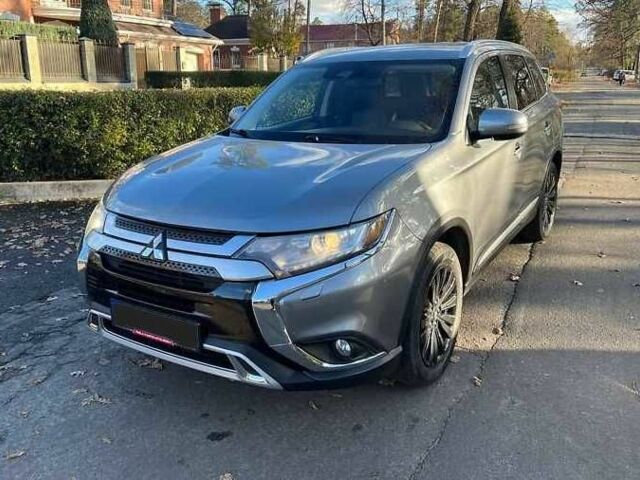 Сірий Міцубісі Аутлендер, об'ємом двигуна 2.4 л та пробігом 120 тис. км за 21200 $, фото 3 на Automoto.ua