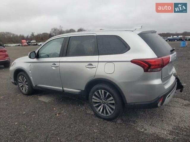 Серый Мицубиси Аутлендер, объемом двигателя 2.36 л и пробегом 112 тыс. км за 2900 $, фото 1 на Automoto.ua