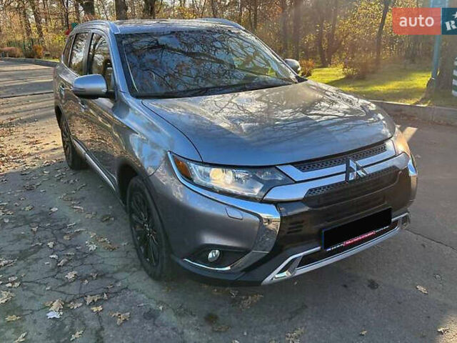 Серый Мицубиси Аутлендер, объемом двигателя 2.4 л и пробегом 120 тыс. км за 23200 $, фото 3 на Automoto.ua