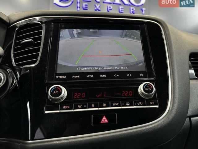 Серый Мицубиси Аутлендер, объемом двигателя 2 л и пробегом 91 тыс. км за 19000 $, фото 6 на Automoto.ua