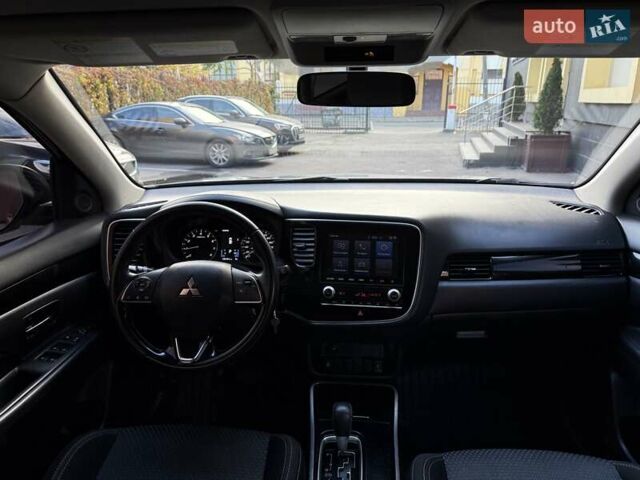 Серый Мицубиси Аутлендер, объемом двигателя 2.36 л и пробегом 136 тыс. км за 14900 $, фото 15 на Automoto.ua