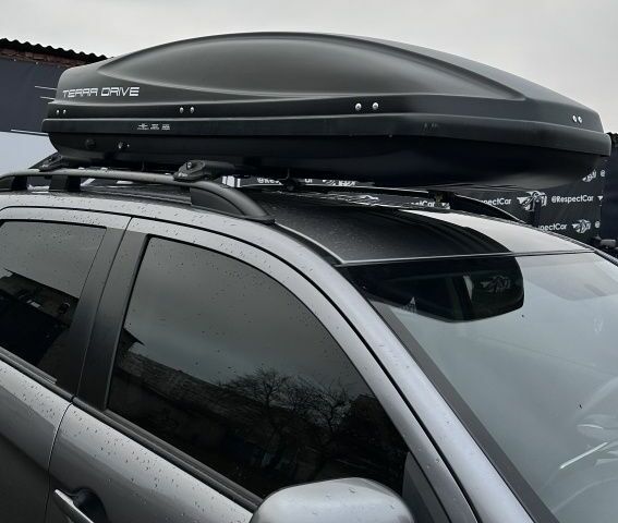 Серый Мицубиси Аутлендер, объемом двигателя 2 л и пробегом 70 тыс. км за 16799 $, фото 4 на Automoto.ua