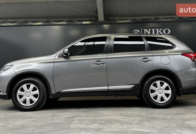 Серый Мицубиси Аутлендер, объемом двигателя 2 л и пробегом 91 тыс. км за 19000 $, фото 1 на Automoto.ua