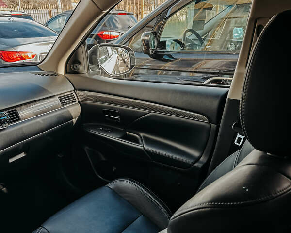 Серый Мицубиси Аутлендер, объемом двигателя 2.4 л и пробегом 95 тыс. км за 16500 $, фото 12 на Automoto.ua