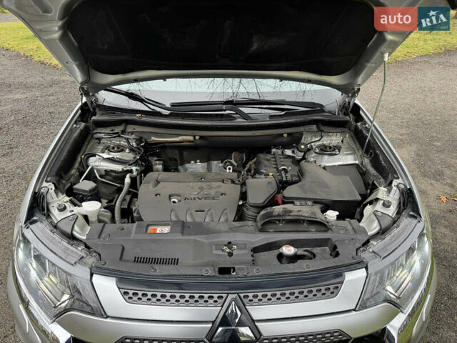Серый Мицубиси Аутлендер, объемом двигателя 2.36 л и пробегом 142 тыс. км за 21500 $, фото 27 на Automoto.ua