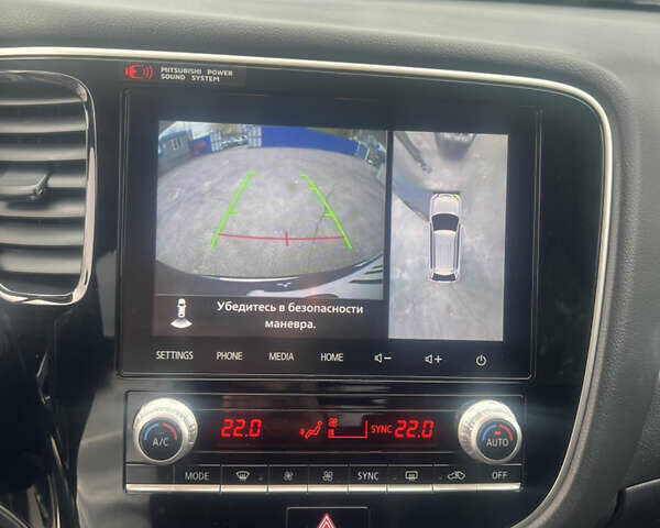 Серый Мицубиси Аутлендер, объемом двигателя 2.4 л и пробегом 99 тыс. км за 22900 $, фото 19 на Automoto.ua