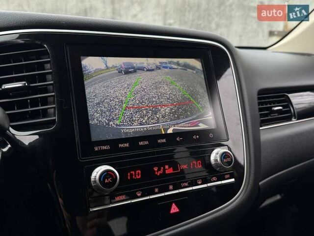 Серый Мицубиси Аутлендер, объемом двигателя 2 л и пробегом 122 тыс. км за 20990 $, фото 17 на Automoto.ua