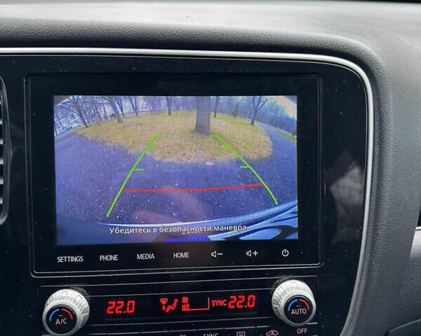 Серый Мицубиси Аутлендер, объемом двигателя 2.36 л и пробегом 142 тыс. км за 21500 $, фото 28 на Automoto.ua