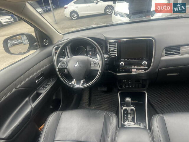 Серый Мицубиси Аутлендер, объемом двигателя 2.4 л и пробегом 99 тыс. км за 22900 $, фото 10 на Automoto.ua