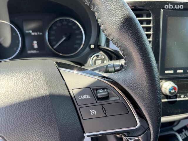 Серый Мицубиси Аутлендер, объемом двигателя 2 л и пробегом 58 тыс. км за 21790 $, фото 22 на Automoto.ua