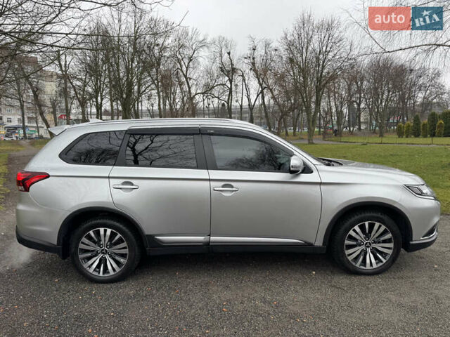 Серый Мицубиси Аутлендер, объемом двигателя 2.36 л и пробегом 142 тыс. км за 21500 $, фото 8 на Automoto.ua