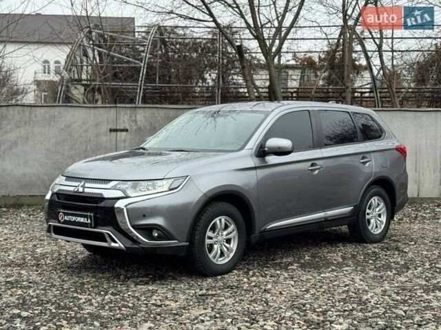 Серый Мицубиси Аутлендер, объемом двигателя 2 л и пробегом 122 тыс. км за 20990 $, фото 4 на Automoto.ua
