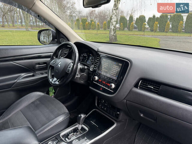 Серый Мицубиси Аутлендер, объемом двигателя 2.36 л и пробегом 142 тыс. км за 21500 $, фото 24 на Automoto.ua