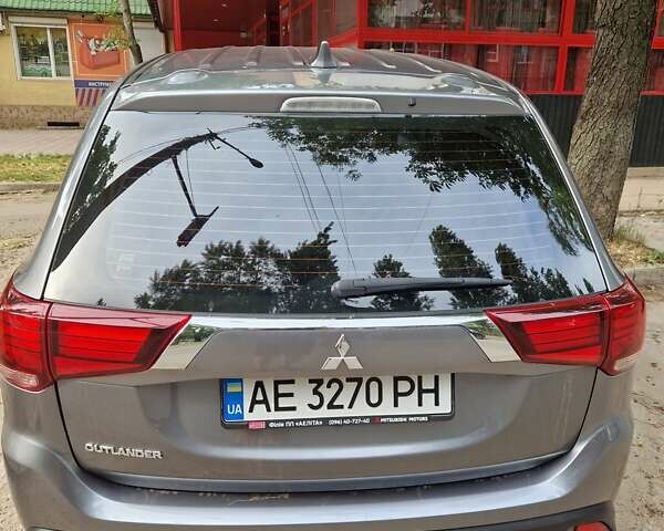 Серый Мицубиси Аутлендер, объемом двигателя 2 л и пробегом 150 тыс. км за 19000 $, фото 4 на Automoto.ua