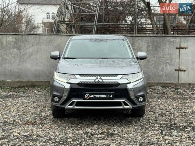 Серый Мицубиси Аутлендер, объемом двигателя 2 л и пробегом 122 тыс. км за 20990 $, фото 3 на Automoto.ua