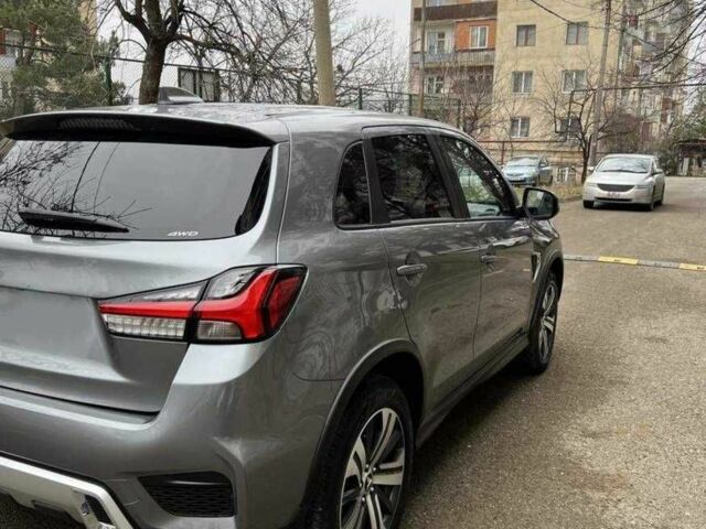 Серый Мицубиси Аутлендер, объемом двигателя 2 л и пробегом 49 тыс. км за 12600 $, фото 4 на Automoto.ua