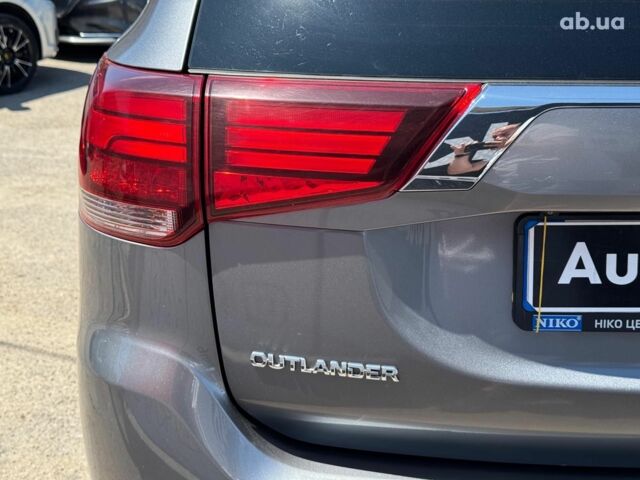 Серый Мицубиси Аутлендер, объемом двигателя 2 л и пробегом 58 тыс. км за 21790 $, фото 9 на Automoto.ua