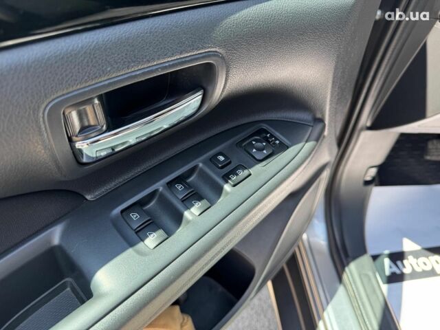 Серый Мицубиси Аутлендер, объемом двигателя 2 л и пробегом 58 тыс. км за 21790 $, фото 18 на Automoto.ua