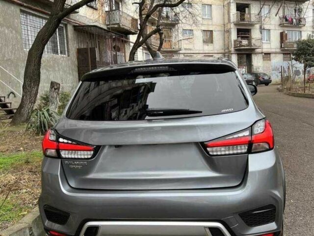 Серый Мицубиси Аутлендер, объемом двигателя 2 л и пробегом 49 тыс. км за 12600 $, фото 5 на Automoto.ua