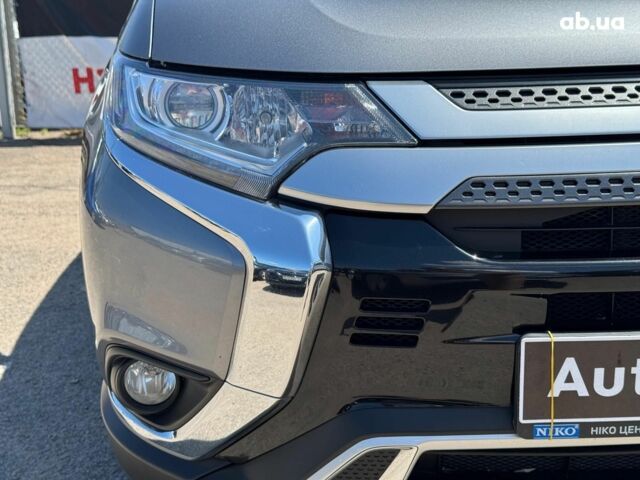 Серый Мицубиси Аутлендер, объемом двигателя 2 л и пробегом 58 тыс. км за 21790 $, фото 7 на Automoto.ua