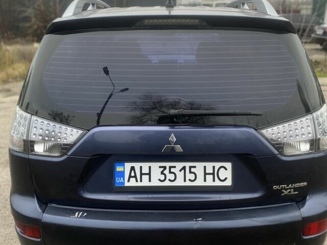 Синій Міцубісі Аутлендер, об'ємом двигуна 2.4 л та пробігом 500 тис. км за 6500 $, фото 5 на Automoto.ua