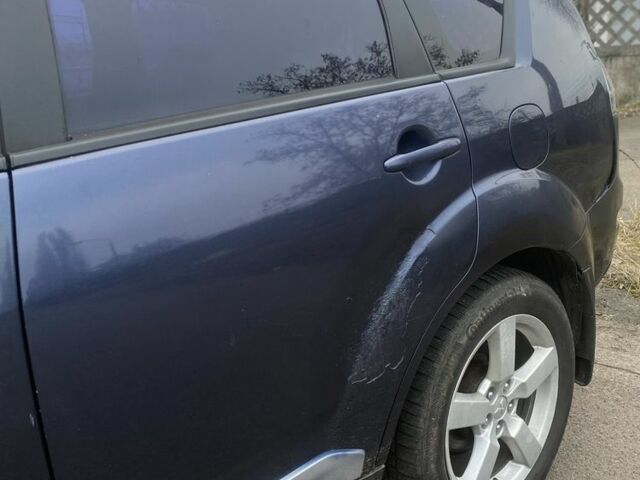 Синій Міцубісі Аутлендер, об'ємом двигуна 2.4 л та пробігом 500 тис. км за 6500 $, фото 3 на Automoto.ua