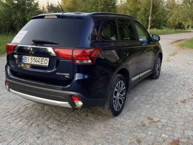 Синий Мицубиси Аутлендер, объемом двигателя 2.4 л и пробегом 0 тыс. км за 14500 $, фото 4 на Automoto.ua