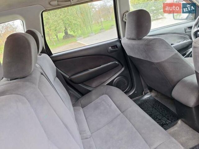 Синій Міцубісі Аутлендер, об'ємом двигуна 2.4 л та пробігом 234 тис. км за 4100 $, фото 21 на Automoto.ua